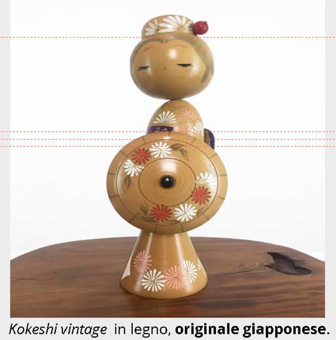 Una kokeshi in legno